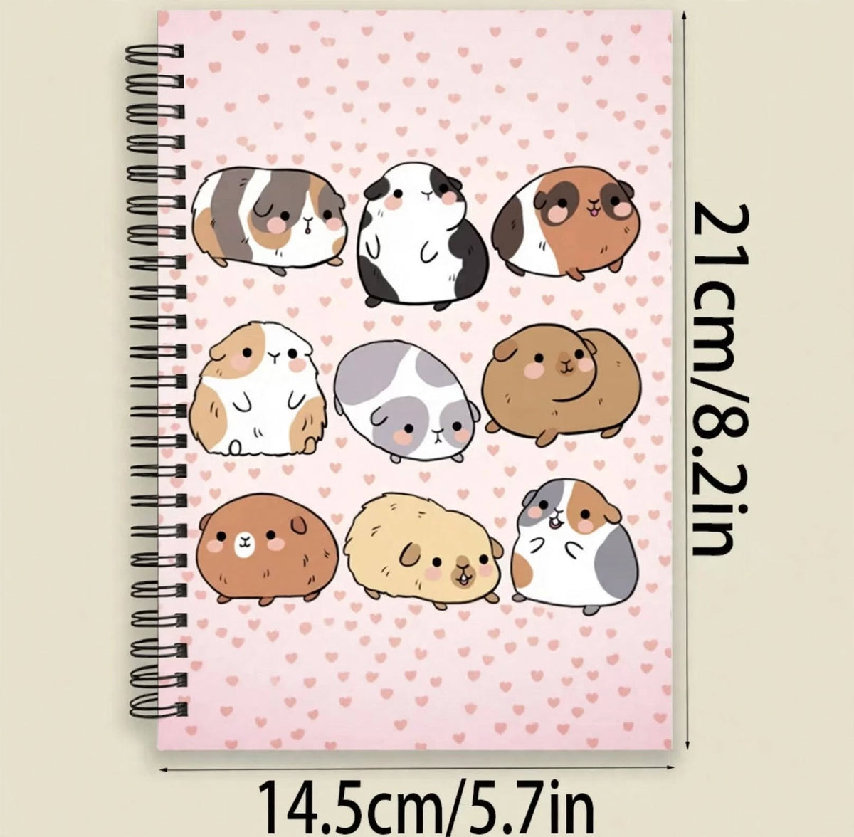 Notebook with a cute guinea pig design and a background of hearts